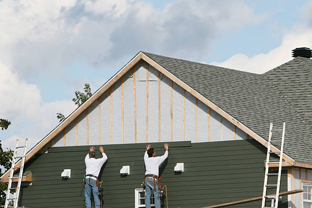 Professional Siding Contractor technician working in Burnham, PA